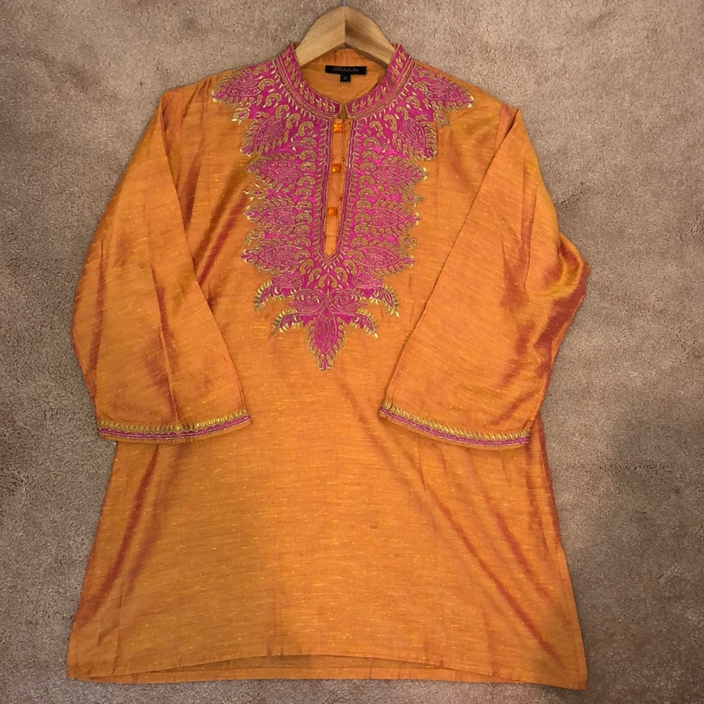 Orange tunic with purple and green embroidery
